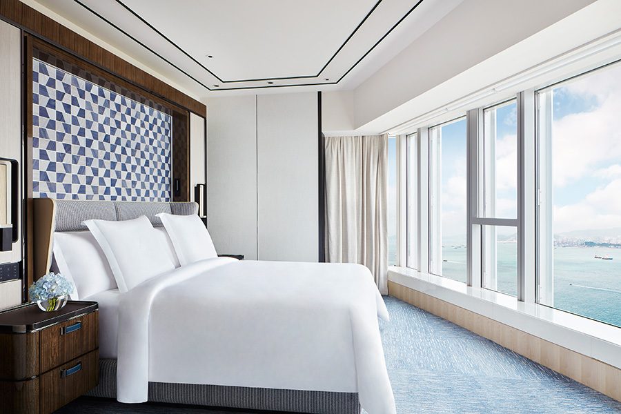A big king sized bed in a Four Seasons hotel room