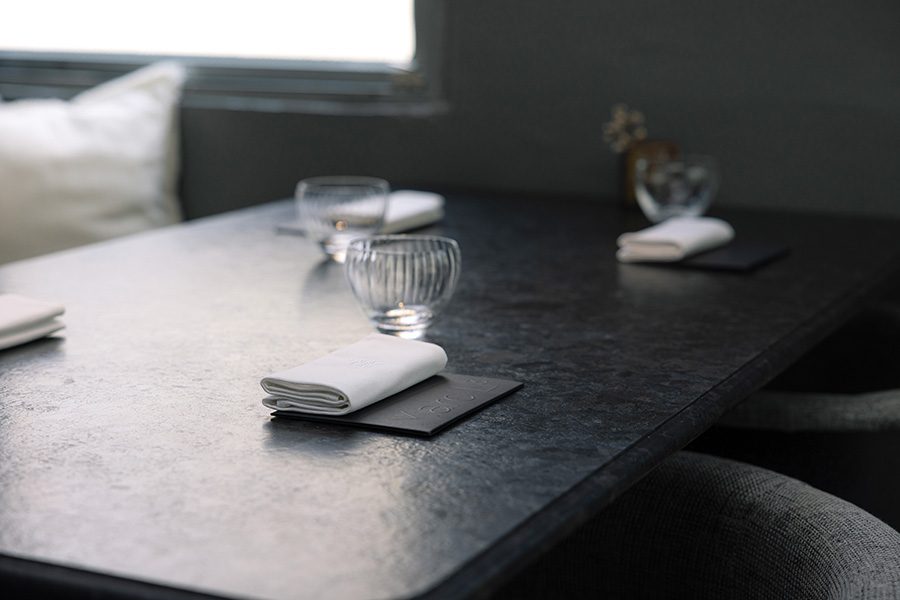 Black dining table at Marc L3 restaurant