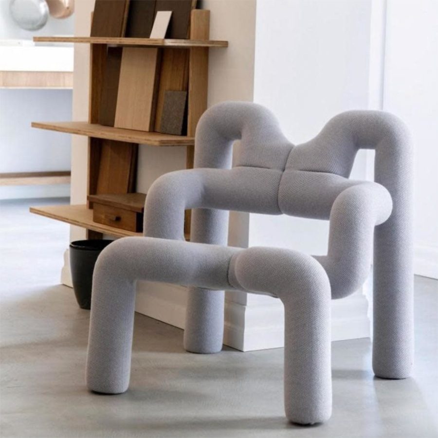 A grey designed chair at a lounge