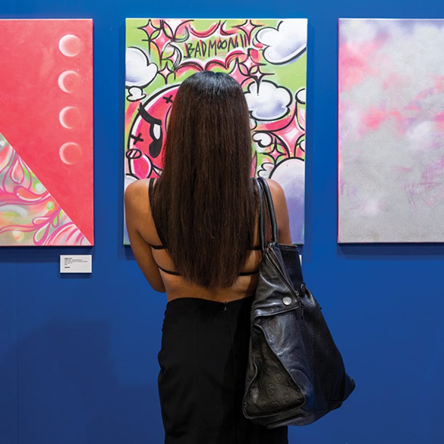 Woman looking at art