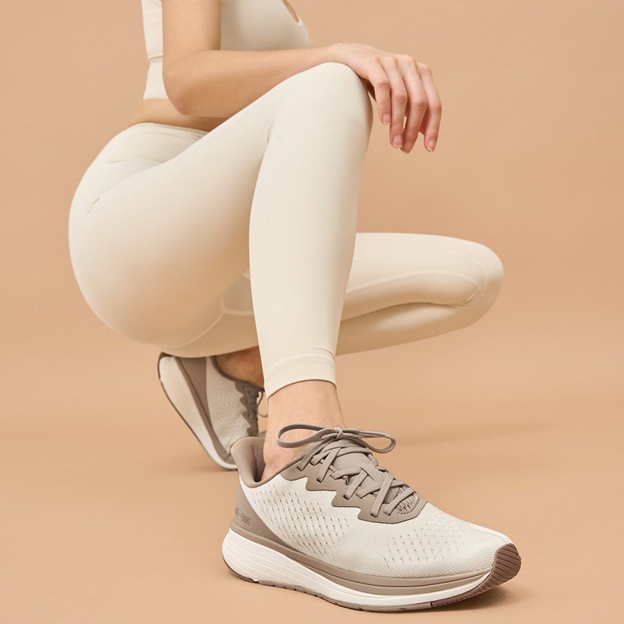 Lane Eight's shoes being shown in the photo.