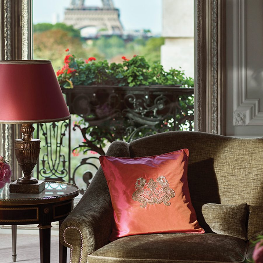 Haute Couture designs and luxurious upholstery within the Hotel Plaza Athenee Eiffel Tower suite