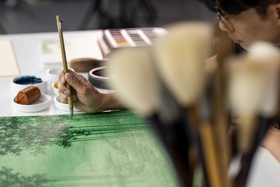 Close up when Ink artist Koon Wai Bong draws.