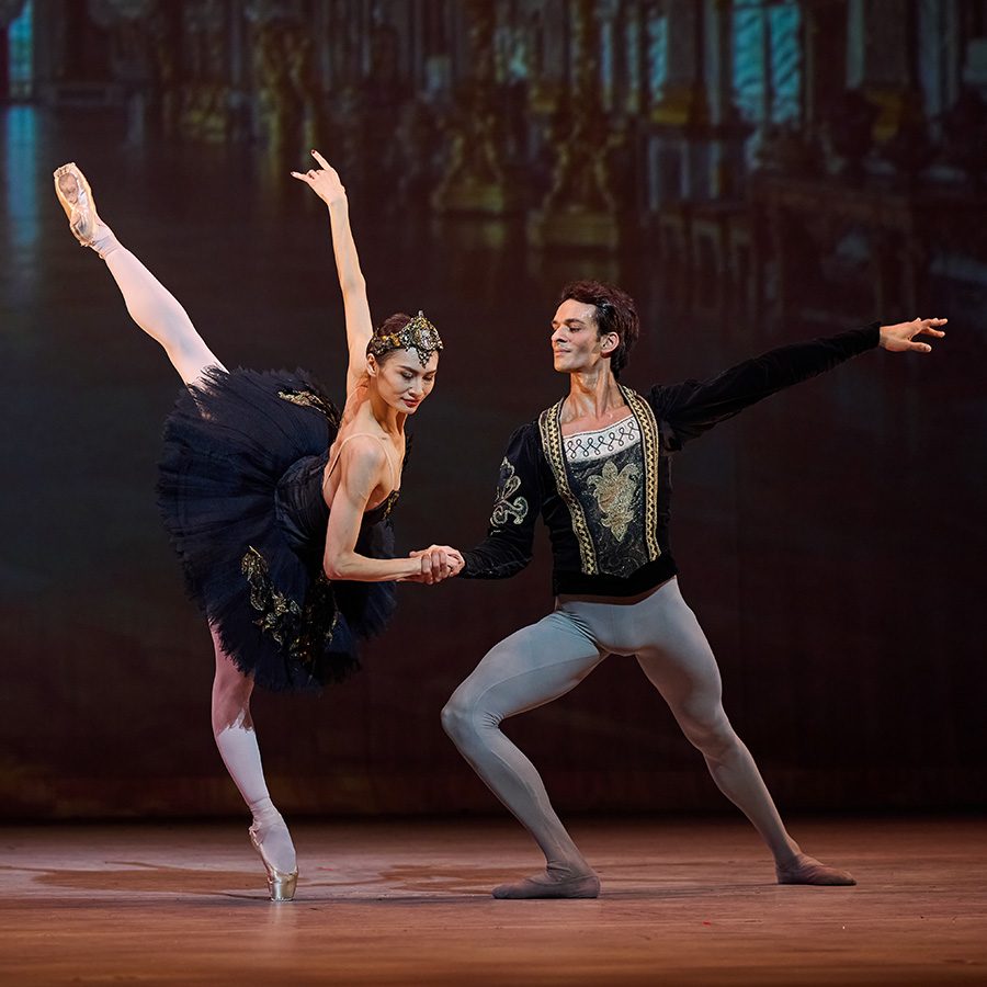 Two ballet dancers from Hong Kong Ballet perform Swan Lake on stage
