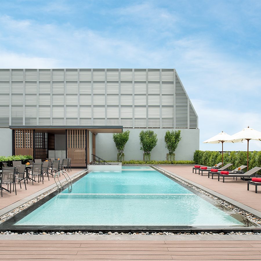 Outdoor swimming pool at Avani Sukhumvit Bangkok Hotel.