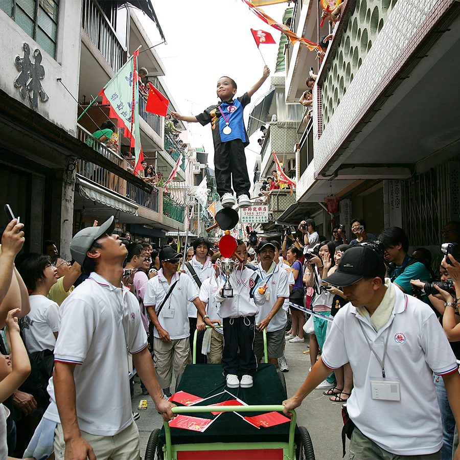 People in the streets celebrating Cheung Chau Bun festival