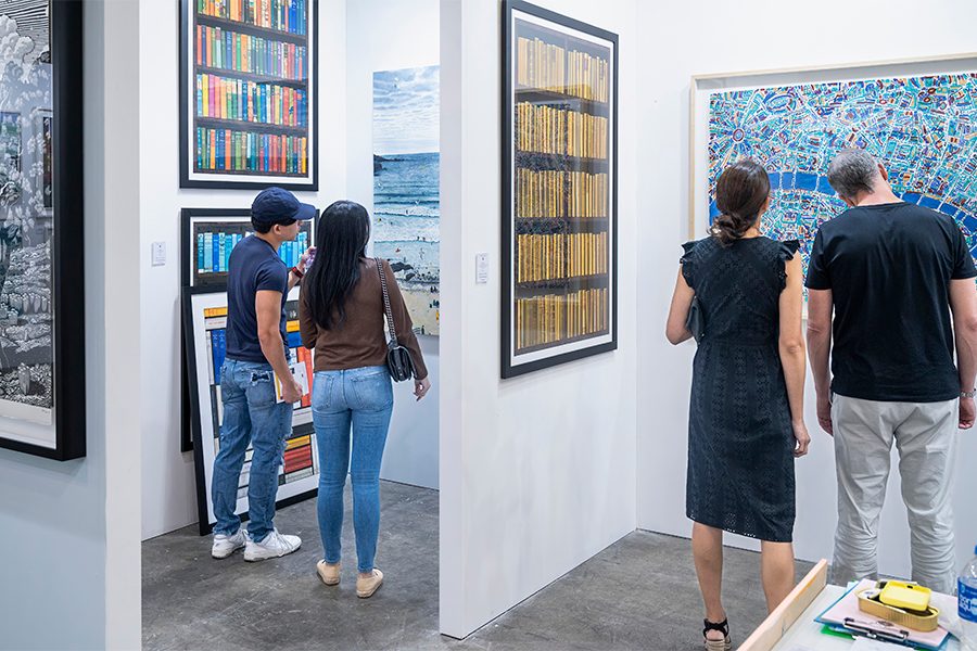 People looking at artworks at the Affordable Art Fair, Hong Kong
