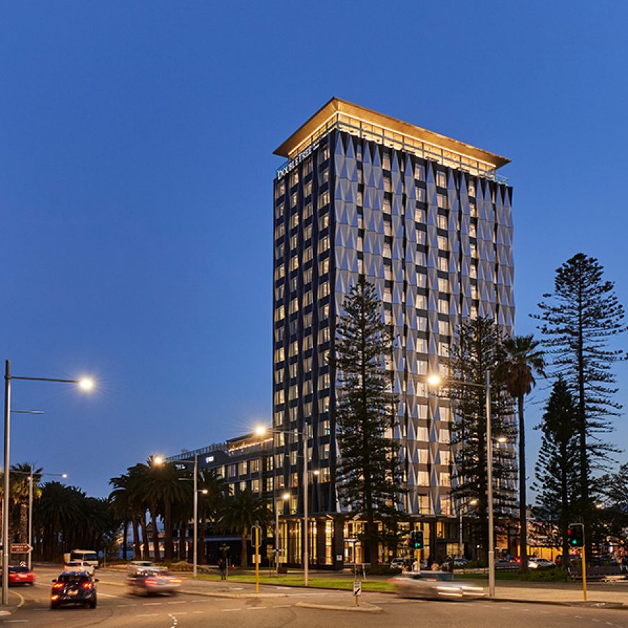 DoubleTree Hotel Exterior at dusk with surrounding street view