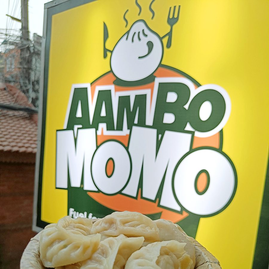 Aambo Momo and a dish of momos