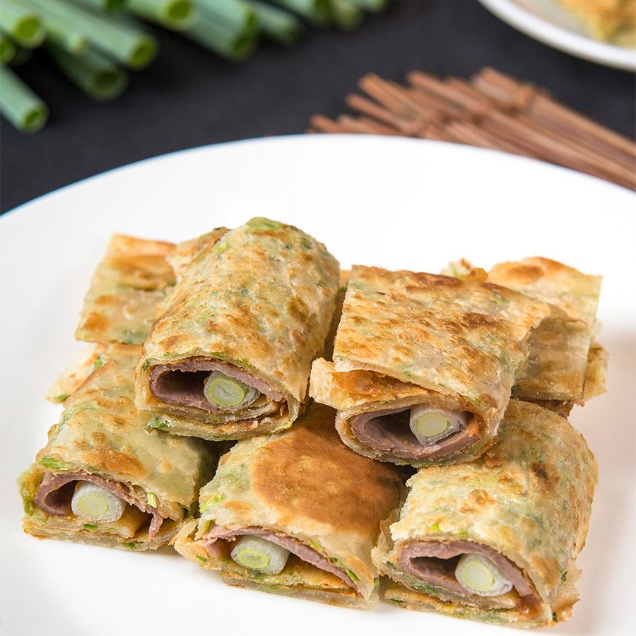 Sliced duck meat and skin wrapped in a crepe at Red Lantern