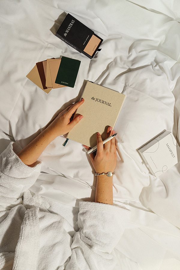 Hand holding notebook