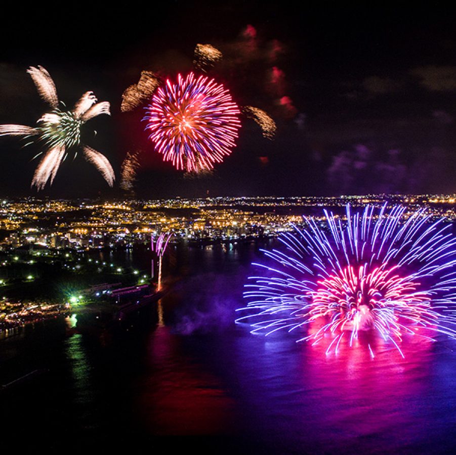 Fireworks over the water for a summer festival in Chatan