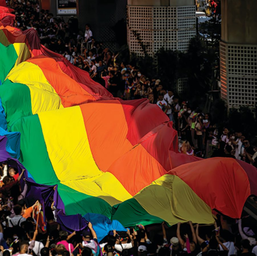 A rainbow flag held up at Bangkok Pride