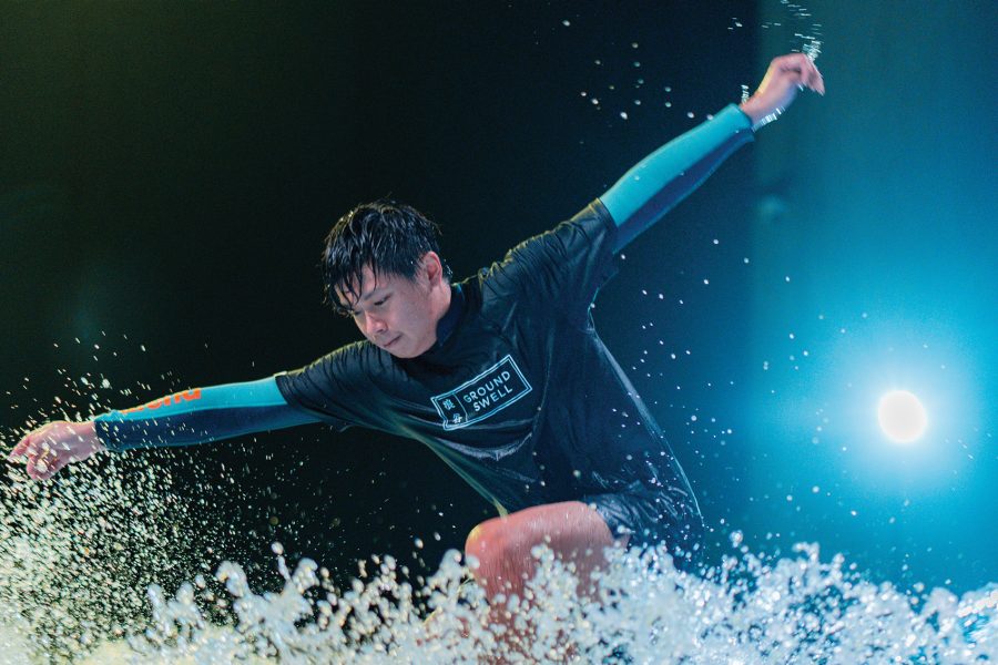 A man is surfing.
