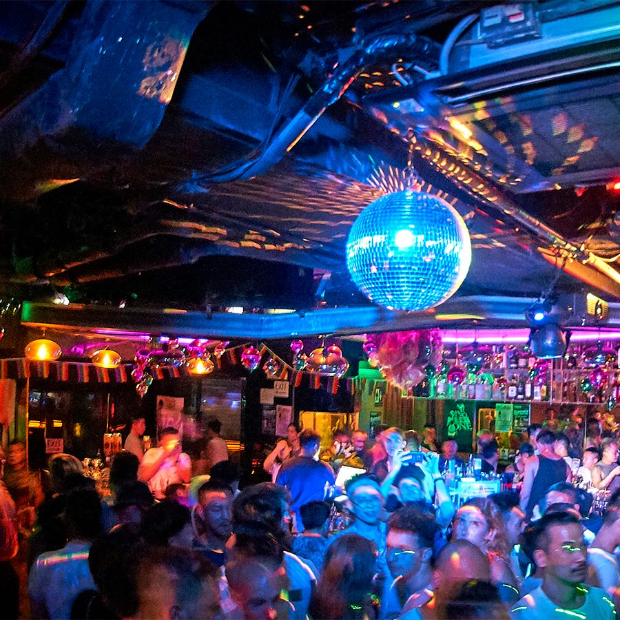 Interior of Cafe Queen by FLM with disco ball and multi-coloured lighting
