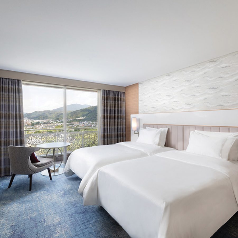 Cosy interior of deluxe twin bedroom at The Westin Miyako Kyoto