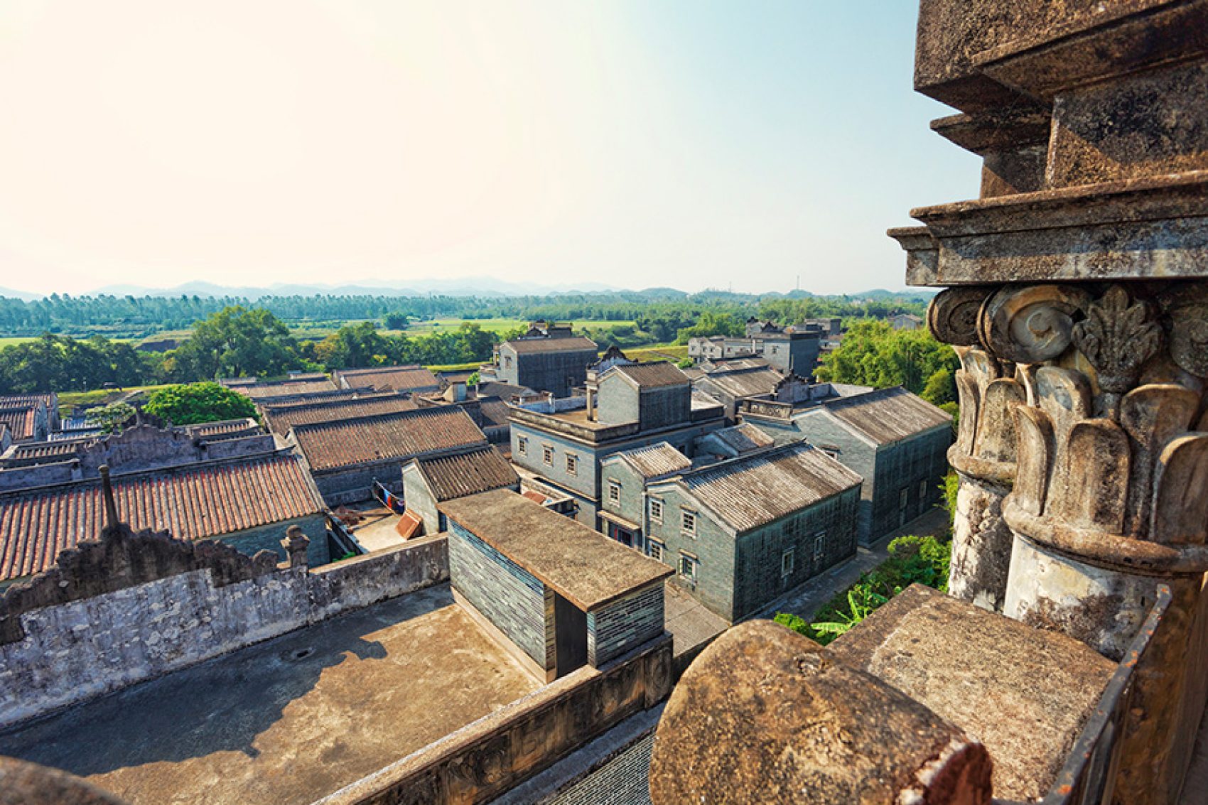 A photo of Kaiping Diaolou and villages in China