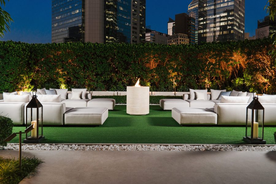 An exterior night view of a common area