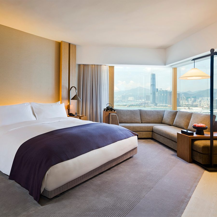 An interior photo of bedroom at the Upper House with a king size bed.