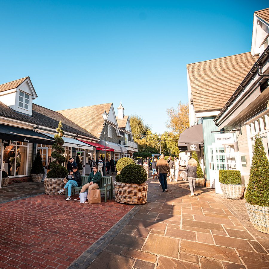 Tourists are visiting Bicester Village on a Sunny Day