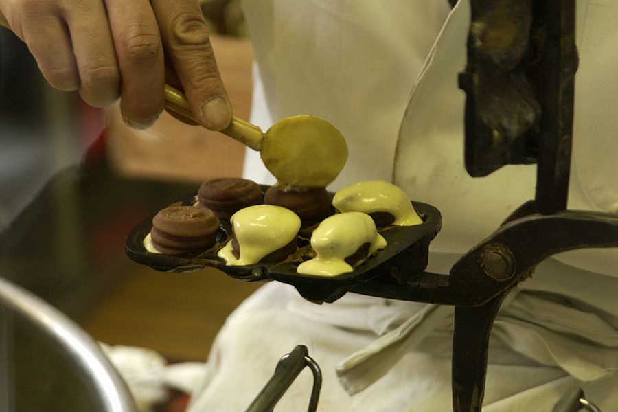 A Japanese is making a Ningyo yaki cakes