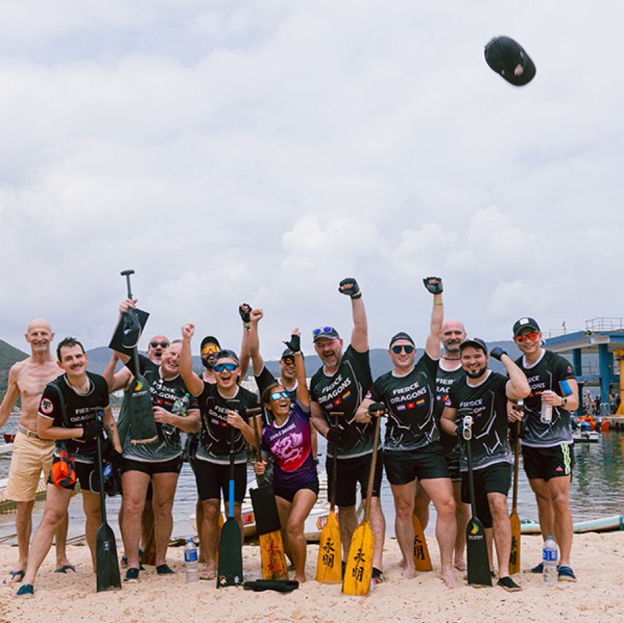 The Fierce Dragons cheering on Stanley Beach