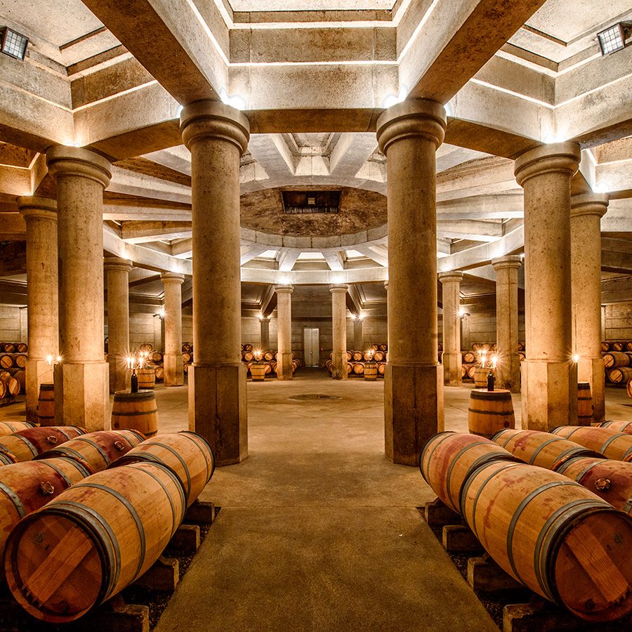 A lot of wine barrels are in the wine cellar at Château Lafite Rothschild