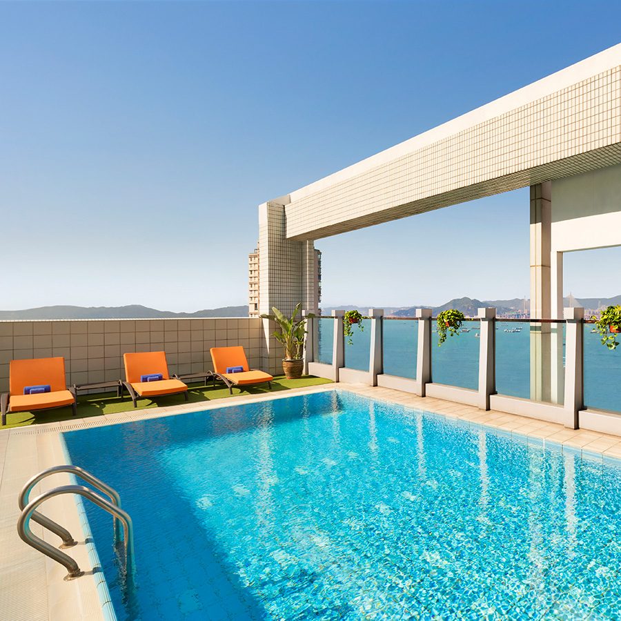 A swimming pool at JEN Hong Kong by Shangri La
