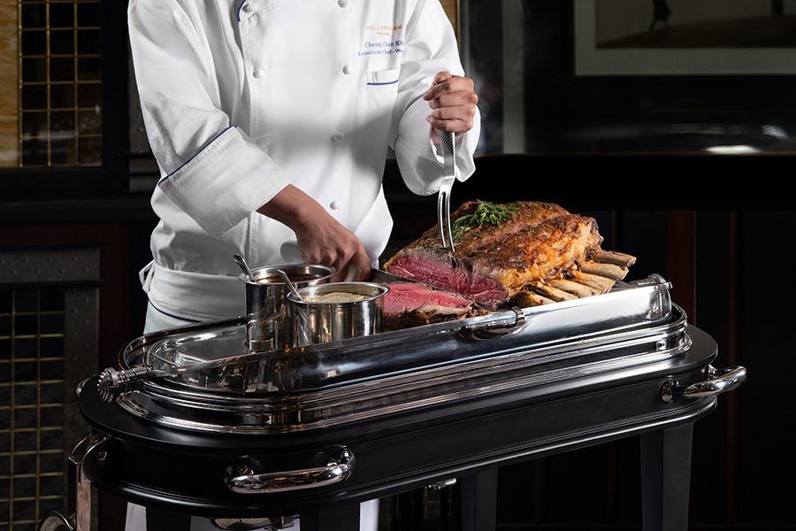 Chef cutting meat
