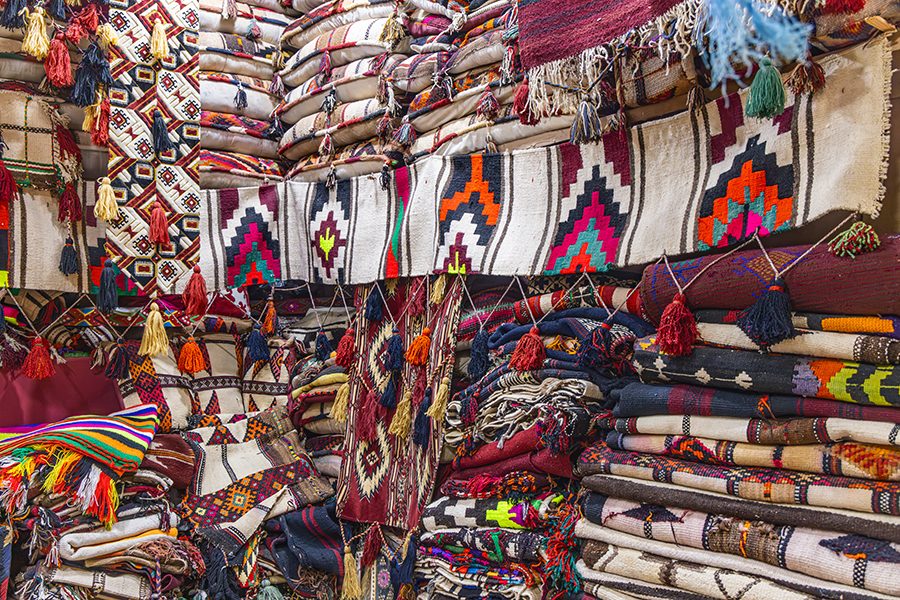 Blankets, pillows and rugs at a souq