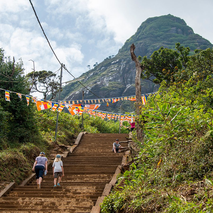 People climbing stairs in Sri Lanka