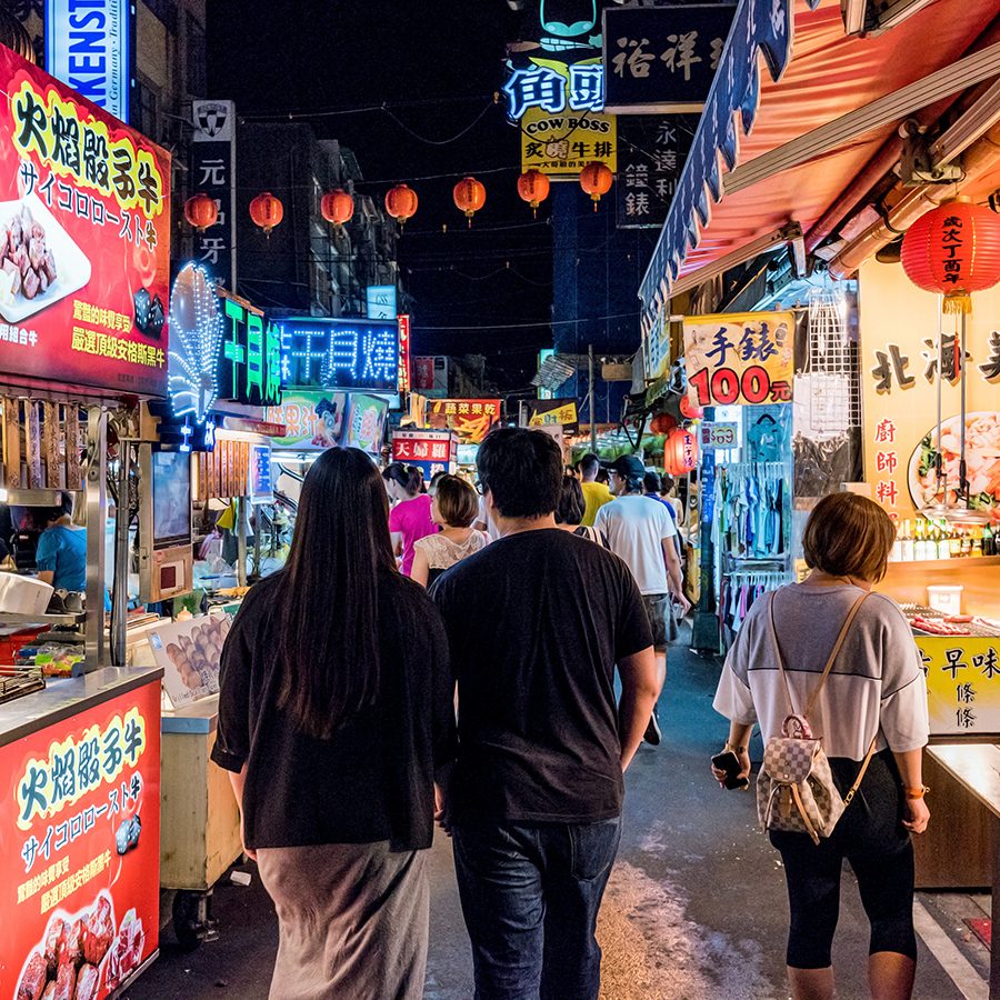 People walking in Raohe Night Market, Taipei 