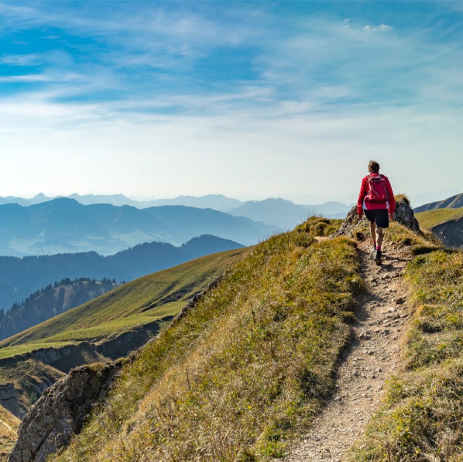 Person hiking in mountains