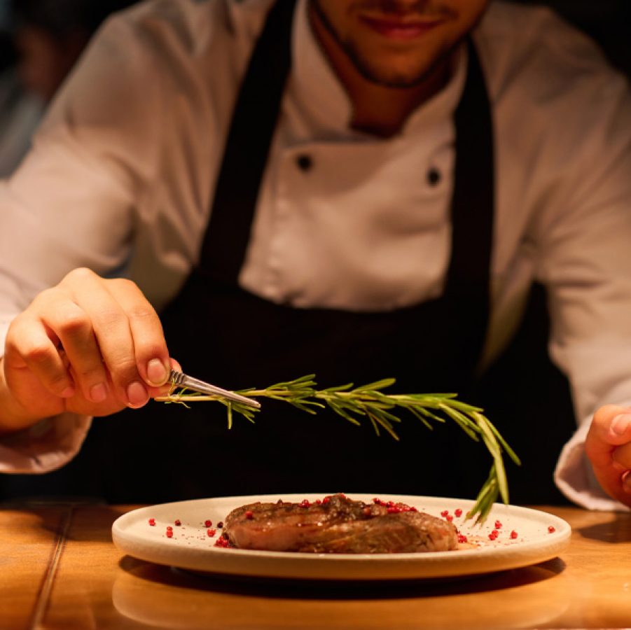 Chef plating a dish