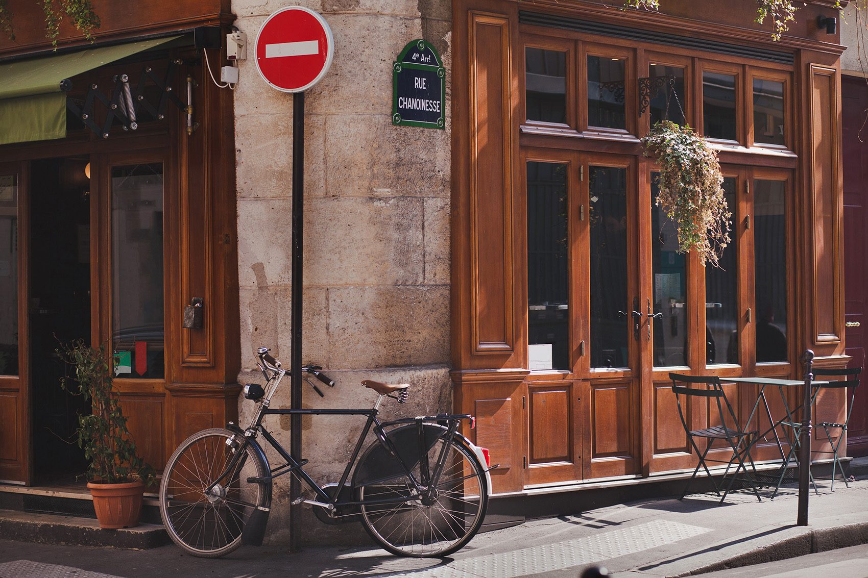 Bike in front of a wooden-tone shop