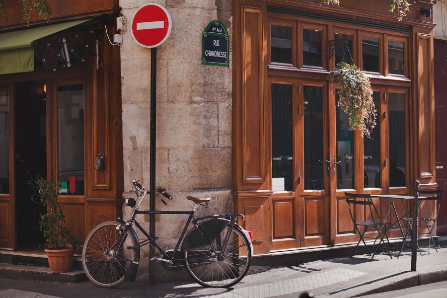 Bike in front of a wooden-tone shop