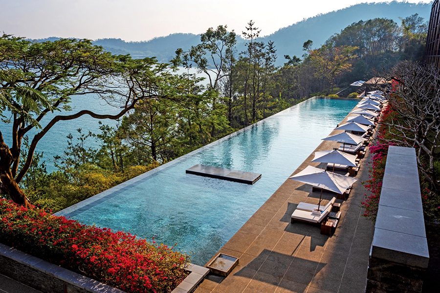 A view of the outdoor swimming pool during the day at The Lalu, Sun Moon Lake hotel in Nantau County, Taiwan