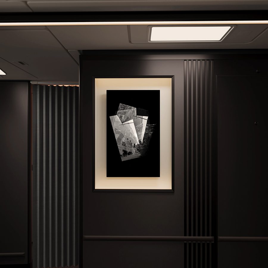 Photographed from the front, Fan Ho's artwork hangs on the wall.