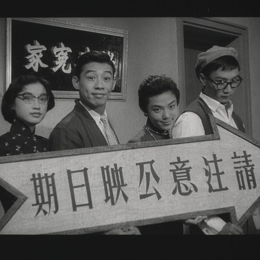 People holding a sign 