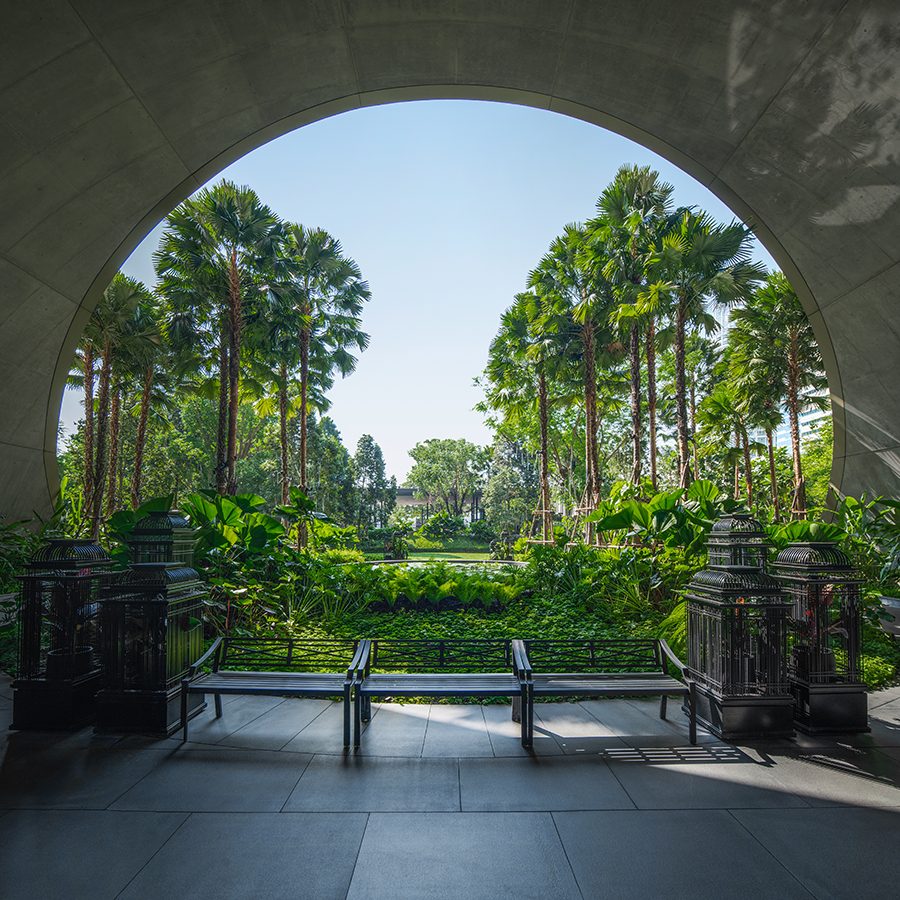 A view of the relaxing garden full of trees and greenery inside Sindhorn Kempinski Hotel Bangkok, Thailand