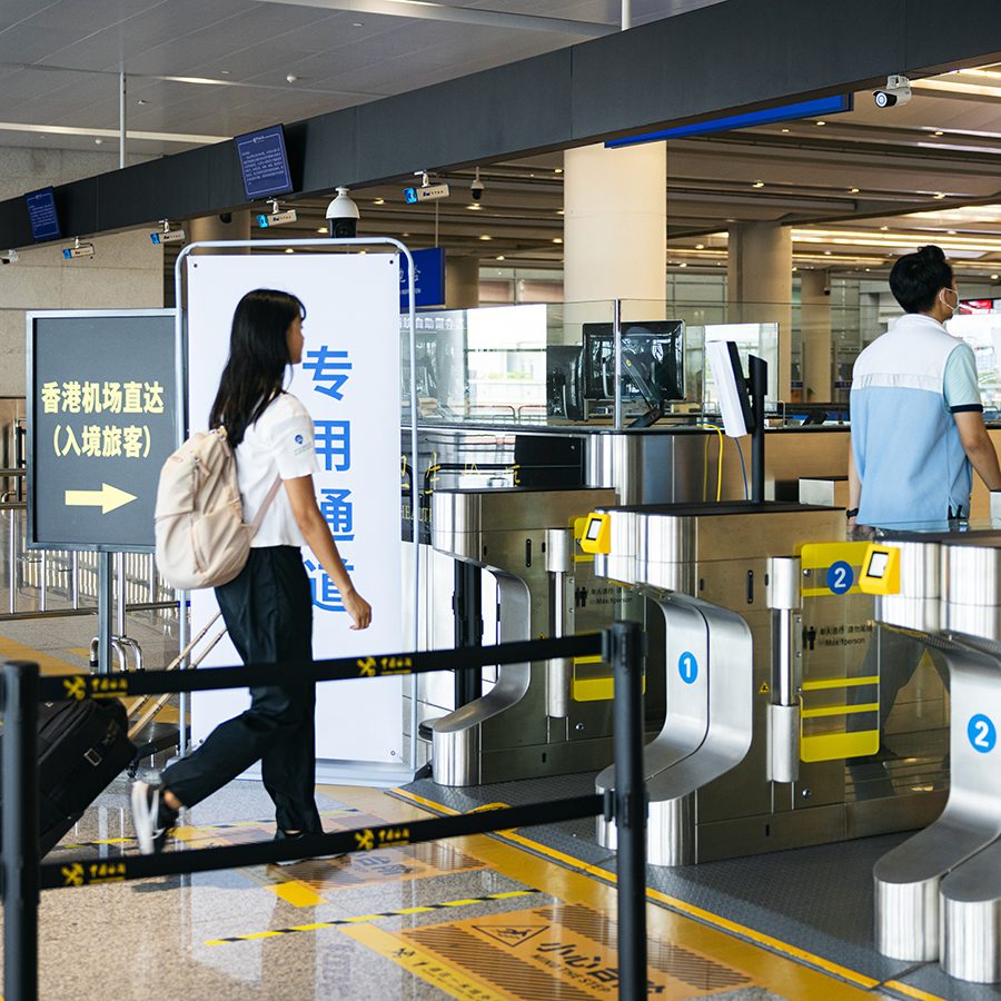 Traveller passing through immigration at Zhuhai