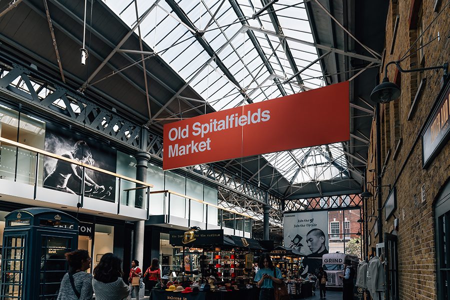 An organge colour sign of Old Spitalfields Market