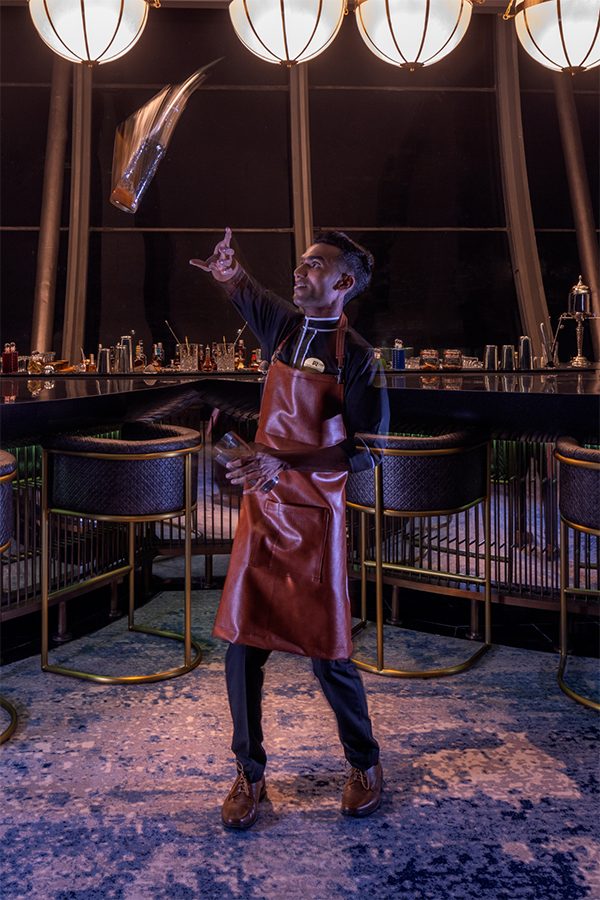 A mixologist at Ratnadipa in Sri Lanka shows up his flaring skills