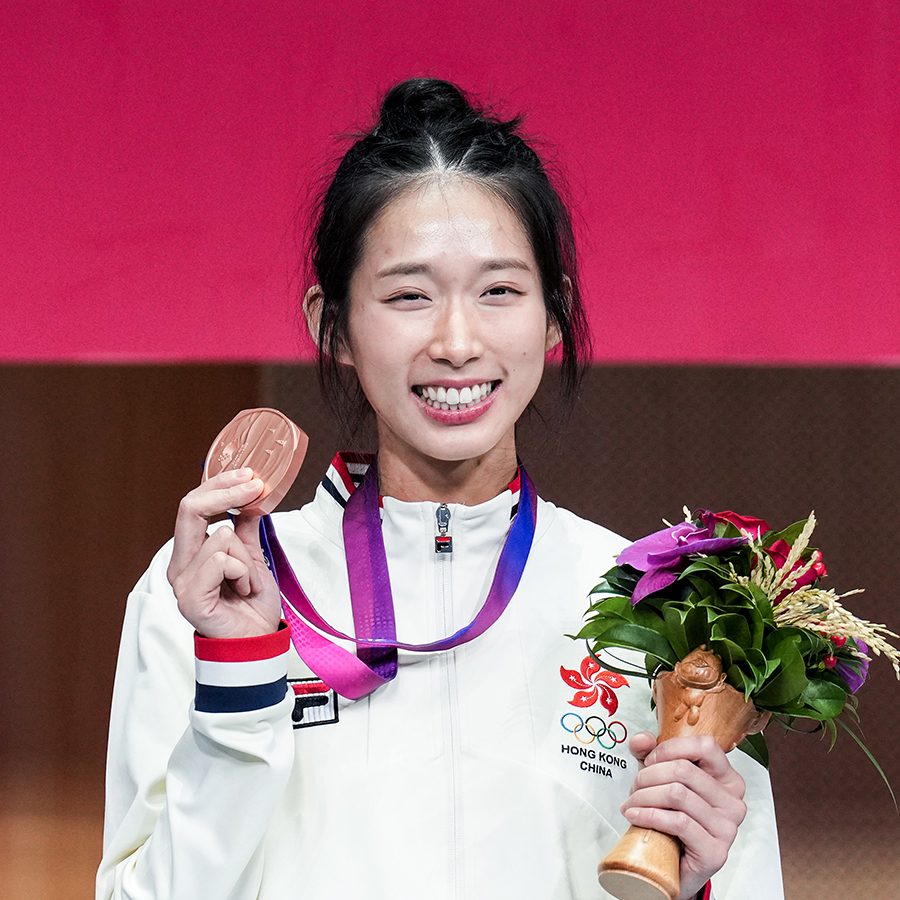 Photo of  Kong Man Wai after receiving the award