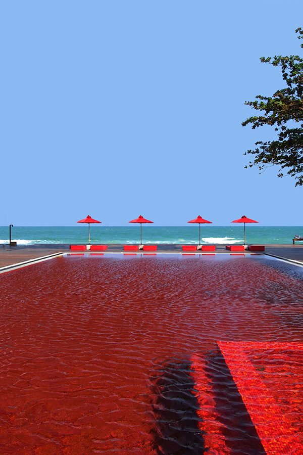 A red swimming pool at The Library Koh Samui
