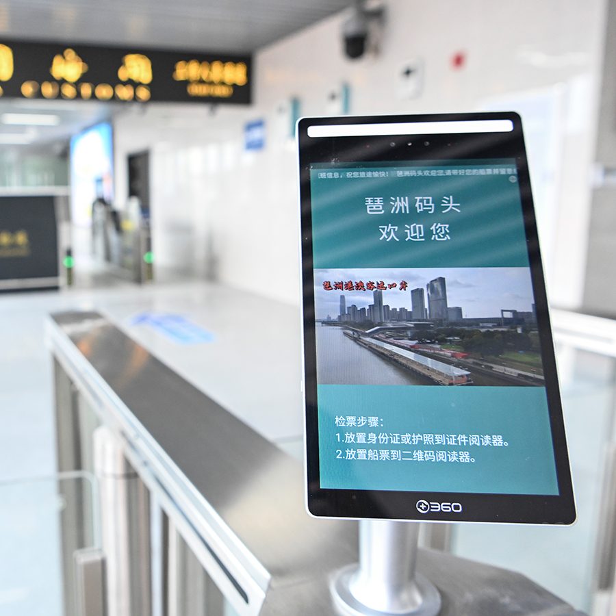 A touch screen device with details about the Canton Fair in Guangzhou, China