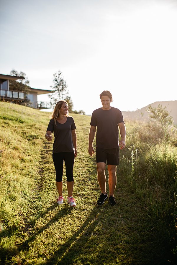 A couple walking at Elysia Wellness Retreat