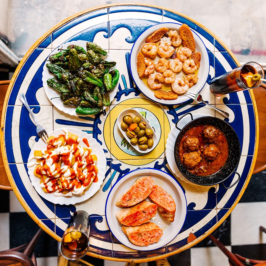 A table of various tapas served in a tapas bar