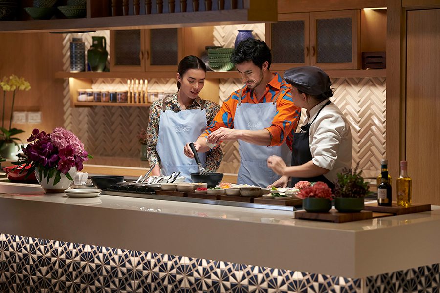 People cooking together at Rakxa
