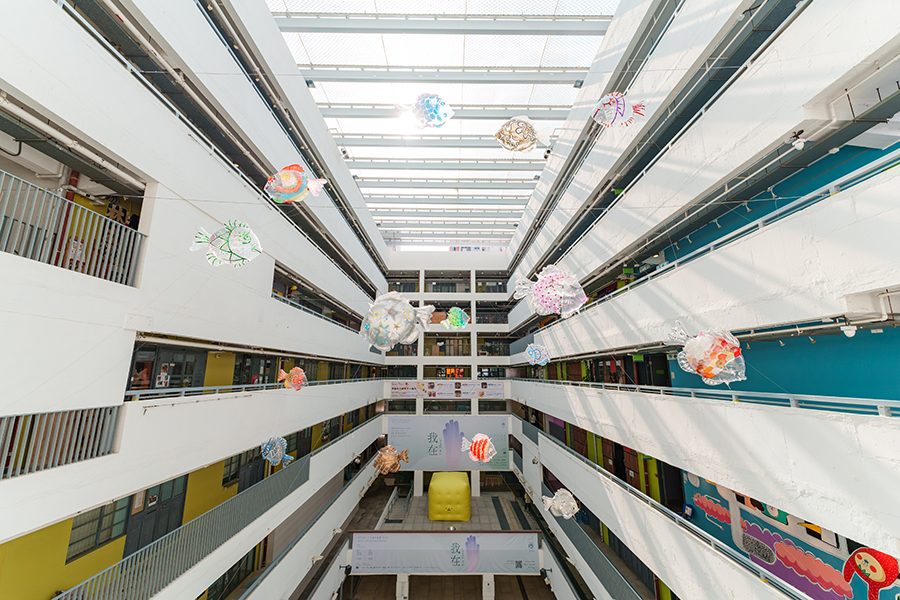 Colourful fish-shaped balloons are suspended from the ceiling of the Jockey Club Creative Arts Centre in Shek Kip Mei, Hong Kong